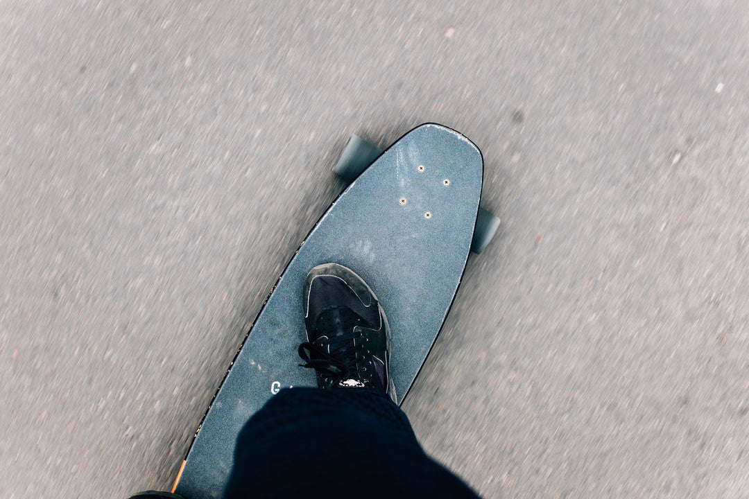 look-down-at-beaten-skateboard - Ready Sweat Go
