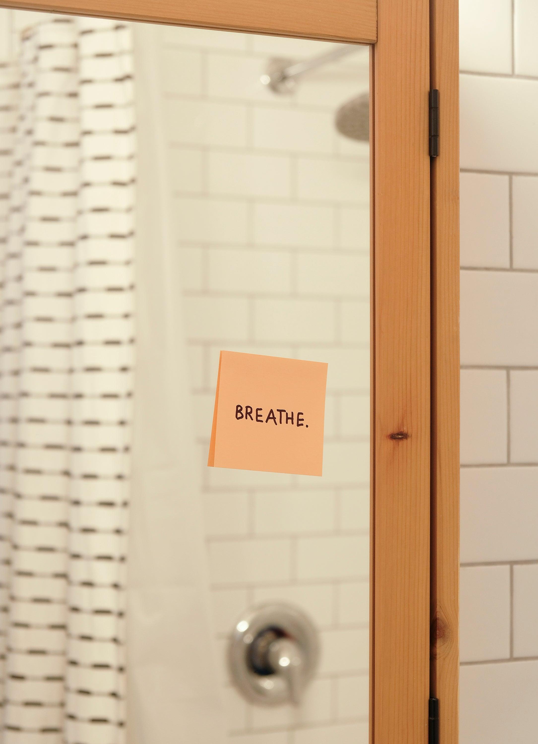 pink-note-reads-breath-on-a-bathroom-mirror - Ready Sweat Go